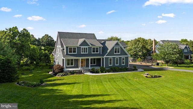 13492 Allnutt Ln, Highland, MD 20777 - view of front of home featuring covered porch and a front lawn