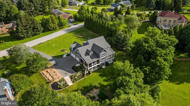 13492 Allnutt Ln, Highland, MD 20777 - aerial perspective of suburban area with a tree filled landscape