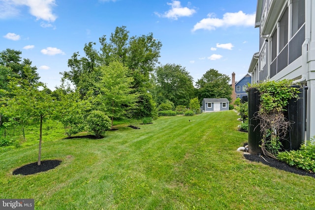 13492 Allnutt Ln, Highland, MD 20777 - view of green lawn featuring an outdoor structure