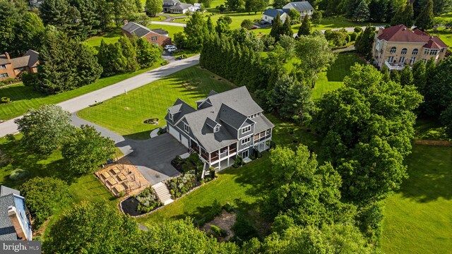 13492 Allnutt Ln, Highland, MD 20777 - aerial perspective of suburban area with a tree filled landscape