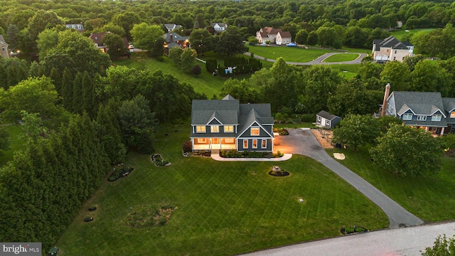 13492 Allnutt Ln, Highland, MD 20777 - aerial view of property and surrounding area featuring a heavily wooded area