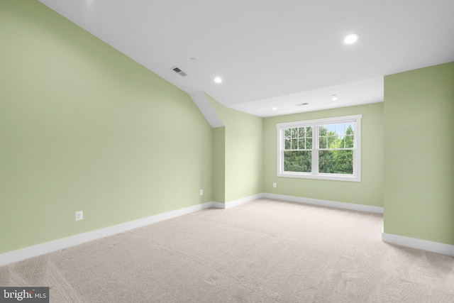 13492 Allnutt Ln, Highland, MD 20777 - spare room featuring baseboards, light colored carpet, recessed lighting, and lofted ceiling