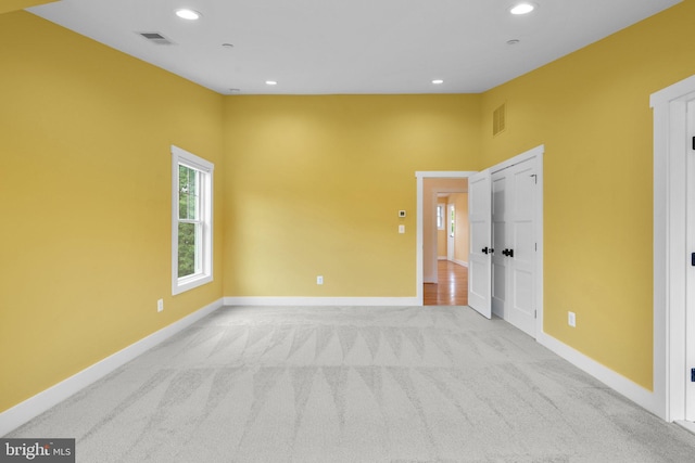 13492 Allnutt Ln, Highland, MD 20777 - unfurnished bedroom with light colored carpet, baseboards, and recessed lighting