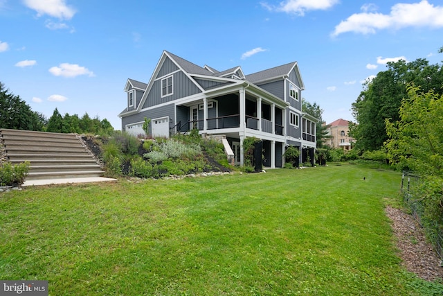 13492 Allnutt Ln, Highland, MD 20777 - view of property exterior featuring board and batten siding, a yard, and an attached garage