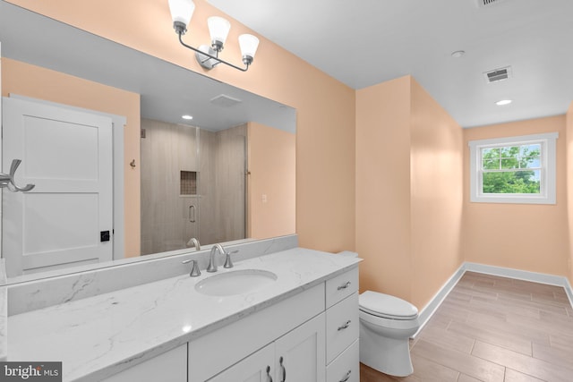 13492 Allnutt Ln, Highland, MD 20777 - full bathroom featuring toilet, vanity, a shower stall, baseboards, and recessed lighting