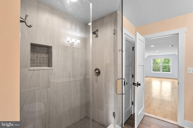 13492 Allnutt Ln, Highland, MD 20777 - full bath featuring a stall shower and wood finished floors