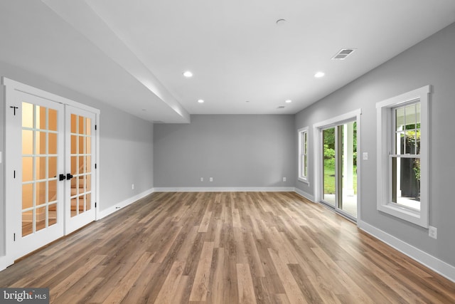 13492 Allnutt Ln, Highland, MD 20777 - spare room featuring french doors, wood finished floors, recessed lighting, and baseboards