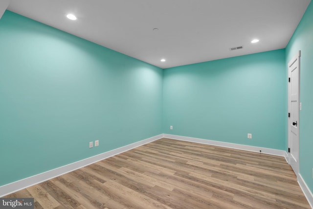 13492 Allnutt Ln, Highland, MD 20777 - spare room with wood finished floors, baseboards, and recessed lighting