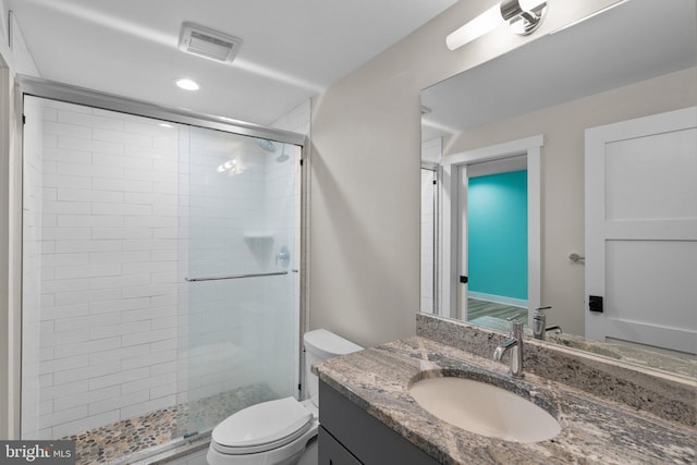 13492 Allnutt Ln, Highland, MD 20777 - bathroom featuring toilet, vanity, a shower stall, and recessed lighting