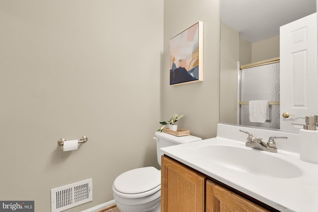 7504 Oldham Way, Alexandria, VA 22315 - bathroom featuring toilet, vanity, and a shower