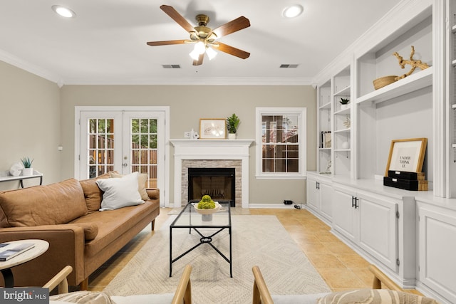 7504 Oldham Way, Alexandria, VA 22315 - living room with french doors, ceiling fan, ornamental molding, recessed lighting, and built in shelves