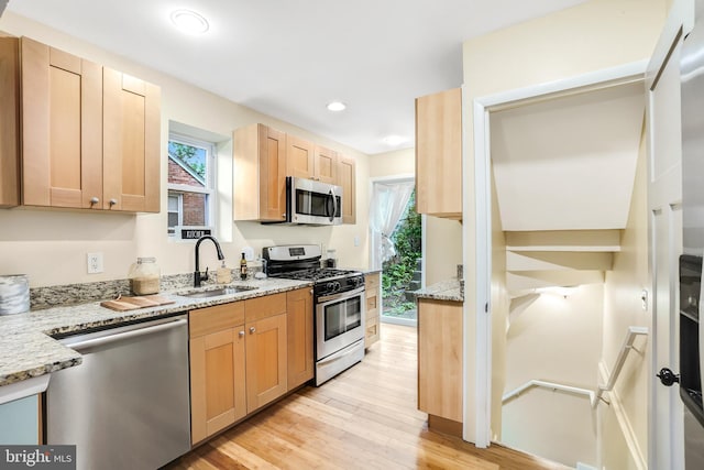 7906 Garland Ave, Takoma Park, MD 20912 - kitchen with appliances with stainless steel finishes, a sink, light wood-type flooring, plenty of natural light, and recessed lighting