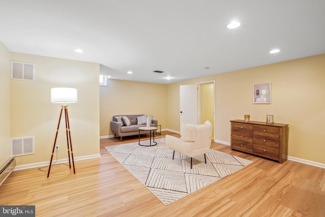 7906 Garland Ave, Takoma Park, MD 20912 - living area featuring light wood finished floors, baseboards, and recessed lighting
