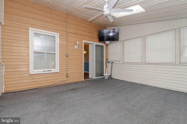 27 Holcumb Ct, Baltimore, MD 21220 - unfurnished sunroom featuring a skylight