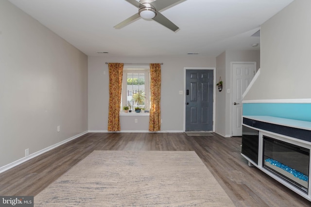 27 Holcumb Ct, Baltimore, MD 21220 - foyer entrance featuring wood finished floors, a ceiling fan, and baseboards