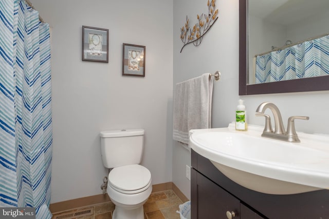 27 Holcumb Ct, Baltimore, MD 21220 - bathroom featuring vanity, baseboards, toilet, and curtained shower