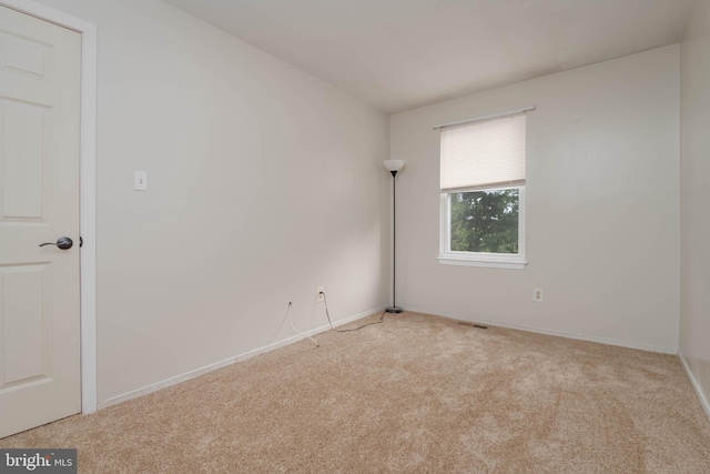 27 Holcumb Ct, Baltimore, MD 21220 - spare room featuring carpet flooring and baseboards