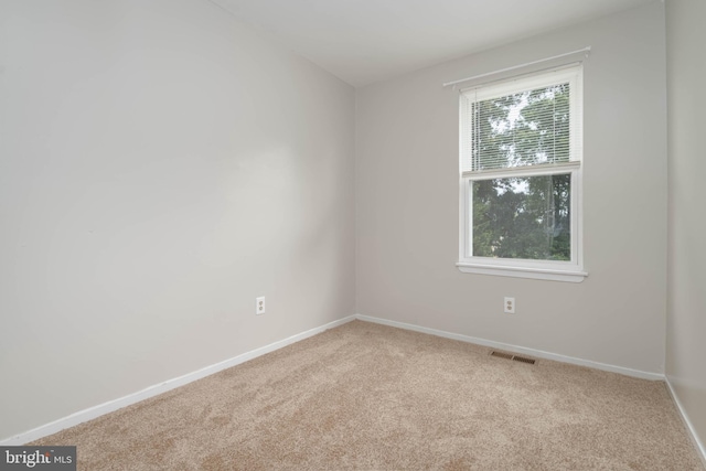 27 Holcumb Ct, Baltimore, MD 21220 - carpeted empty room featuring baseboards