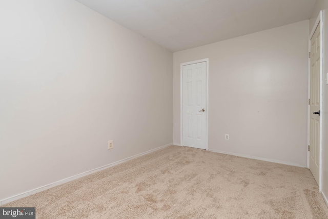 27 Holcumb Ct, Baltimore, MD 21220 - unfurnished bedroom featuring carpet and baseboards
