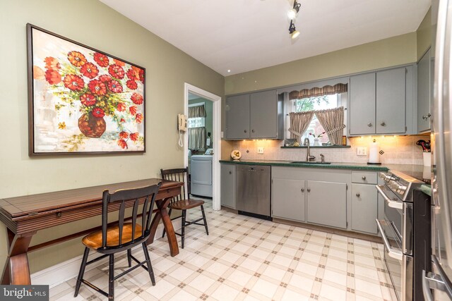 1431 Wheatsheaf Ln, Abington, PA 19001 - kitchen with stainless steel appliances, gray cabinets, a sink, light floors, and tasteful backsplash
