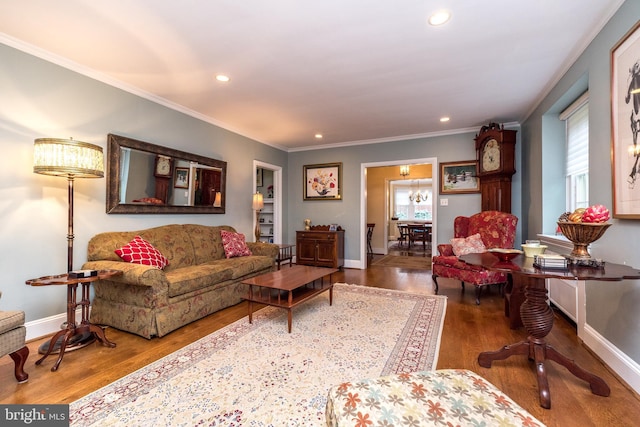 1431 Wheatsheaf Ln, Abington, PA 19001 - living room featuring plenty of natural light, wood finished floors, recessed lighting, crown molding, and baseboards
