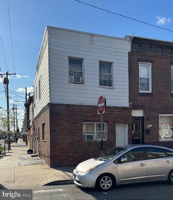 2554 S Sheridan St, Philadelphia, PA 19148 - townhome / multi-family property with brick siding and cooling unit