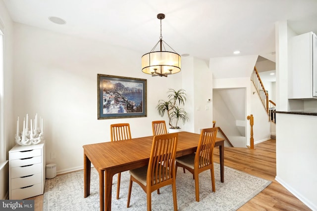 25366 Ashbury, Chantilly, VA 20152 - dining room with a chandelier, baseboards, light wood-style flooring, stairs, and recessed lighting