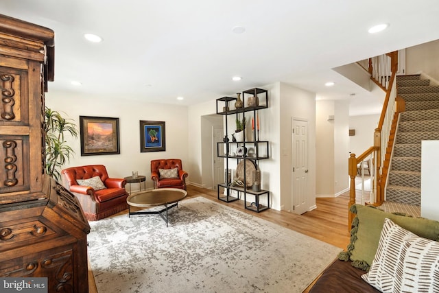 25366 Ashbury, Chantilly, VA 20152 - sitting room featuring stairs, wood finished floors, recessed lighting, and baseboards