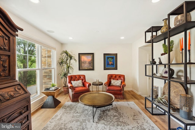 25366 Ashbury, Chantilly, VA 20152 - living area with light wood finished floors, recessed lighting, and baseboards