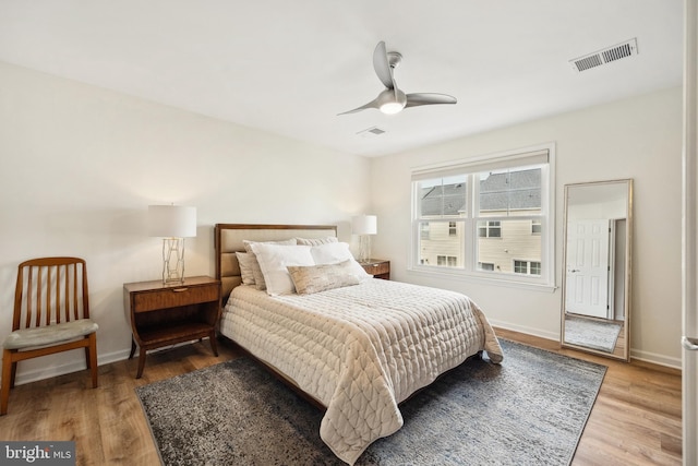 25366 Ashbury, Chantilly, VA 20152 - bedroom featuring light wood-type flooring, baseboards, and a ceiling fan