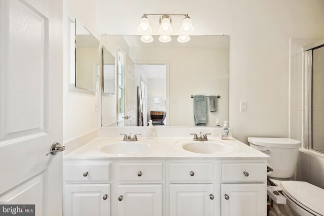 25366 Ashbury, Chantilly, VA 20152 - ensuite bathroom with a shower with shower door, toilet, and double vanity