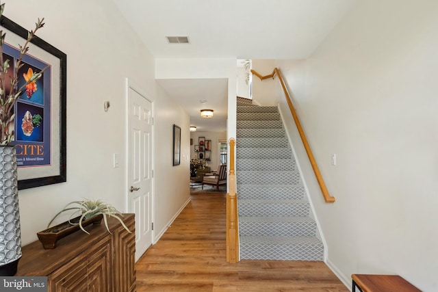 25366 Ashbury, Chantilly, VA 20152 - hall featuring stairway, light wood finished floors, and baseboards