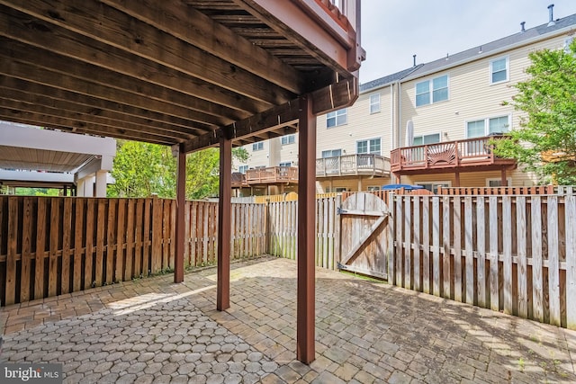 25366 Ashbury, Chantilly, VA 20152 - fenced backyard featuring a gate, a patio area, and a residential view