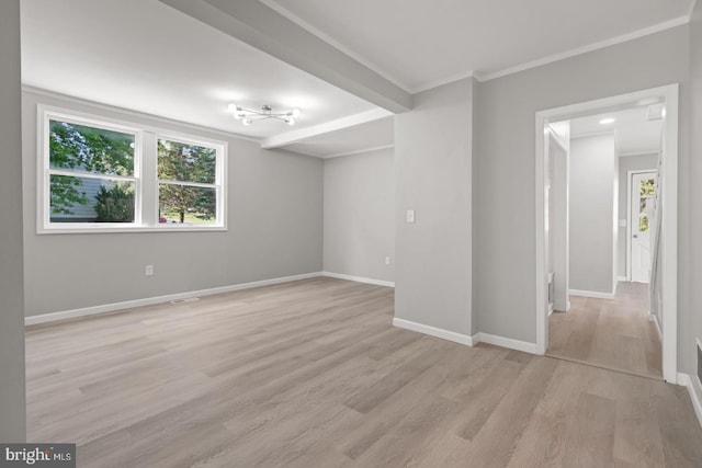 213 Redwood St, Harrisburg, PA 17109 - spare room featuring ornamental molding, light wood-style flooring, and baseboards