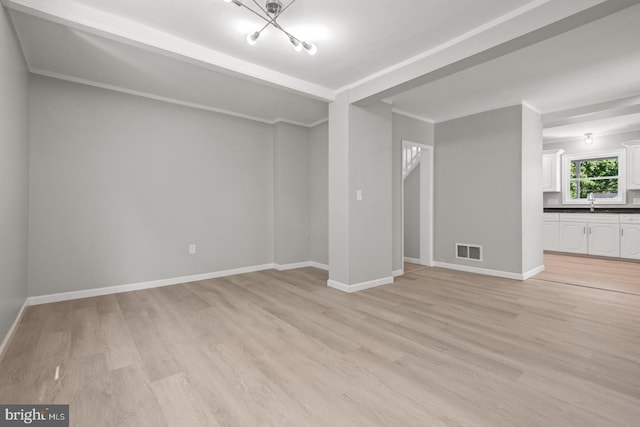 213 Redwood St, Harrisburg, PA 17109 - unfurnished living room with light wood-type flooring and baseboards