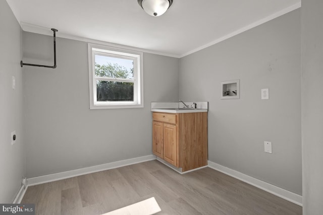 213 Redwood St, Harrisburg, PA 17109 - laundry area featuring hookup for a washing machine, light wood finished floors, electric dryer hookup, cabinet space, and baseboards