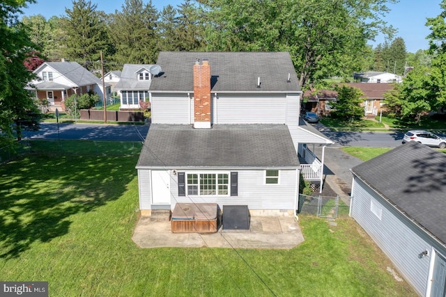 213 Redwood St, Harrisburg, PA 17109 - rear view of property with a chimney, a shingled roof, a patio, and a residential view