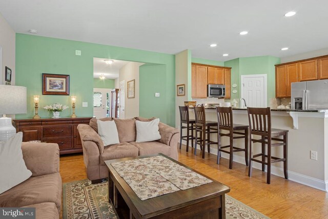 26360 Timbercreek Ln, Millsboro, DE 19966 - living room featuring light wood-type flooring and recessed lighting