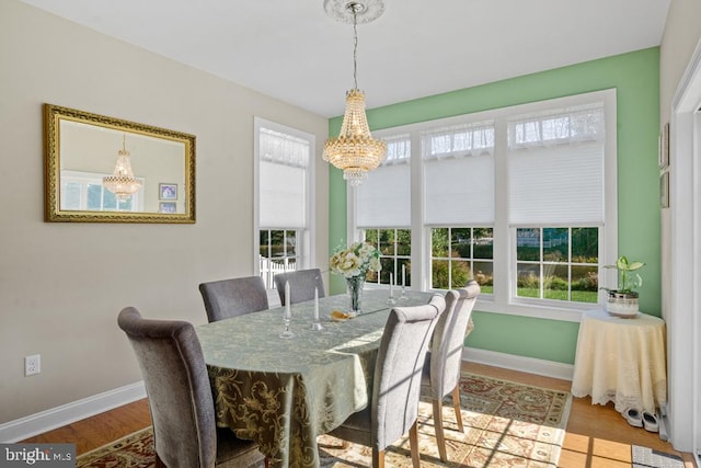 26360 Timbercreek Ln, Millsboro, DE 19966 - dining room featuring a chandelier, healthy amount of natural light, and baseboards
