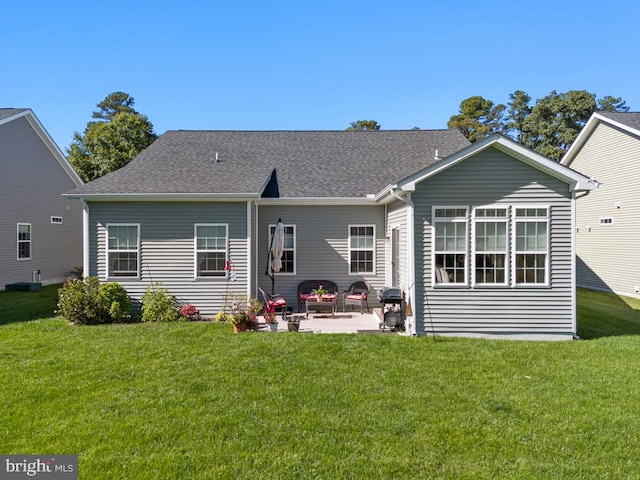 26360 Timbercreek Ln, Millsboro, DE 19966 - rear view of property with a patio, a yard, and a shingled roof