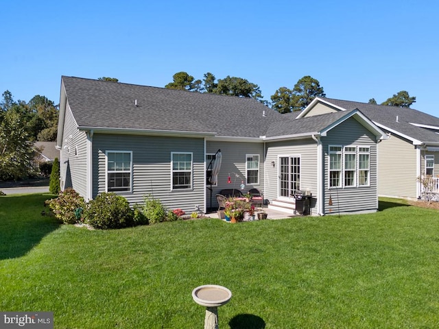 26360 Timbercreek Ln, Millsboro, DE 19966 - back of property with a yard, a patio, and a shingled roof