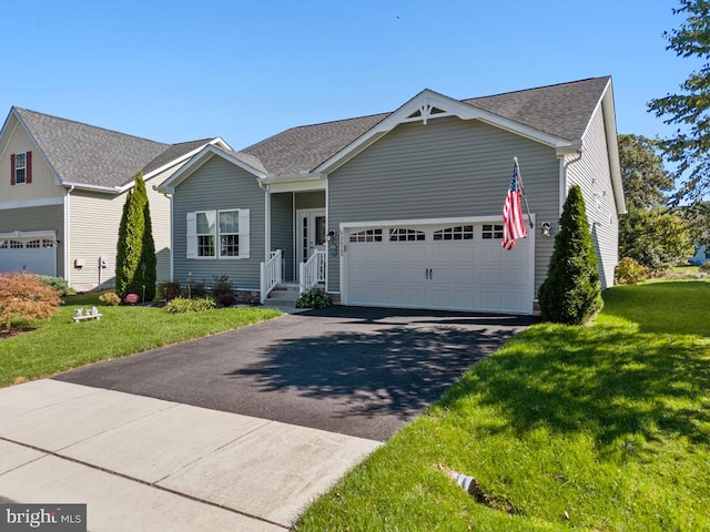 26360 Timbercreek Ln, Millsboro, DE 19966 - view of front of home featuring driveway, a front yard, an attached garage, and roof with shingles