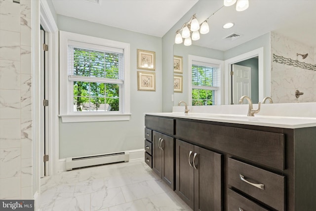 309 Conestoga Rd, Wayne, PA 19087 - bathroom with a baseboard radiator, marble look tile flooring, double vanity, and a tile shower