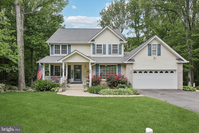 9410 Carleigh Ct, Owings, MD 20736 - traditional-style home featuring driveway, covered porch, a front lawn, an attached garage, and a shingled roof