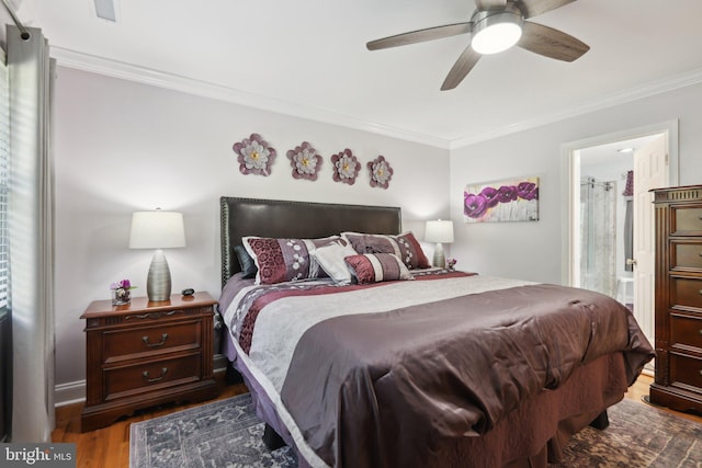 9410 Carleigh Ct, Owings, MD 20736 - bedroom with ornamental molding, wood finished floors, a ceiling fan, and connected bathroom