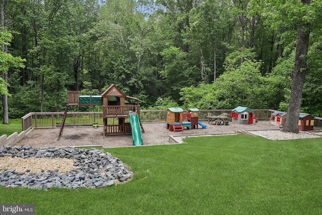 9410 Carleigh Ct, Owings, MD 20736 - view of play area featuring a yard and a wooded view