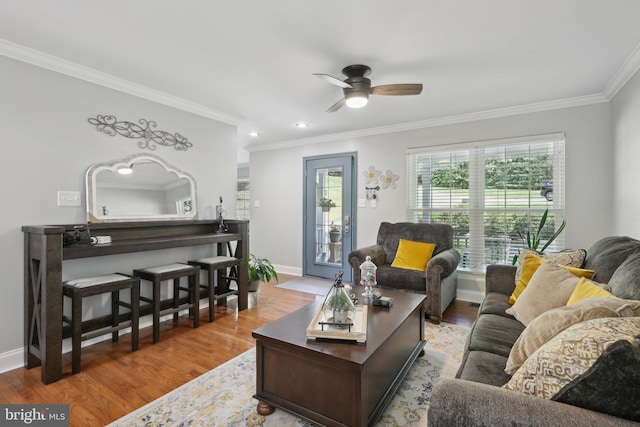 9410 Carleigh Ct, Owings, MD 20736 - living room featuring ornamental molding, wood finished floors, a ceiling fan, baseboards, and recessed lighting