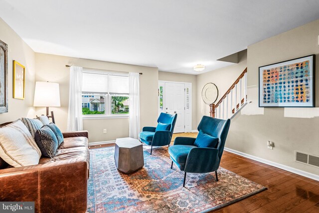 4047 Holly Way, Doylestown, PA 18902 - living area with stairway, wood finished floors, and baseboards