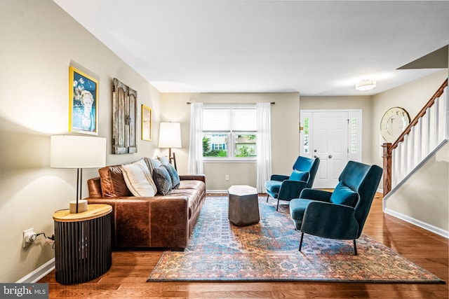 4047 Holly Way, Doylestown, PA 18902 - living room with wood finished floors, stairway, and baseboards