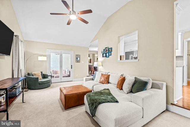 4047 Holly Way, Doylestown, PA 18902 - carpeted living area with ceiling fan, high vaulted ceiling, and baseboards